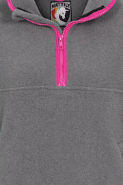 nattily dressed grey fleece quarter zip close up with bright pink trim