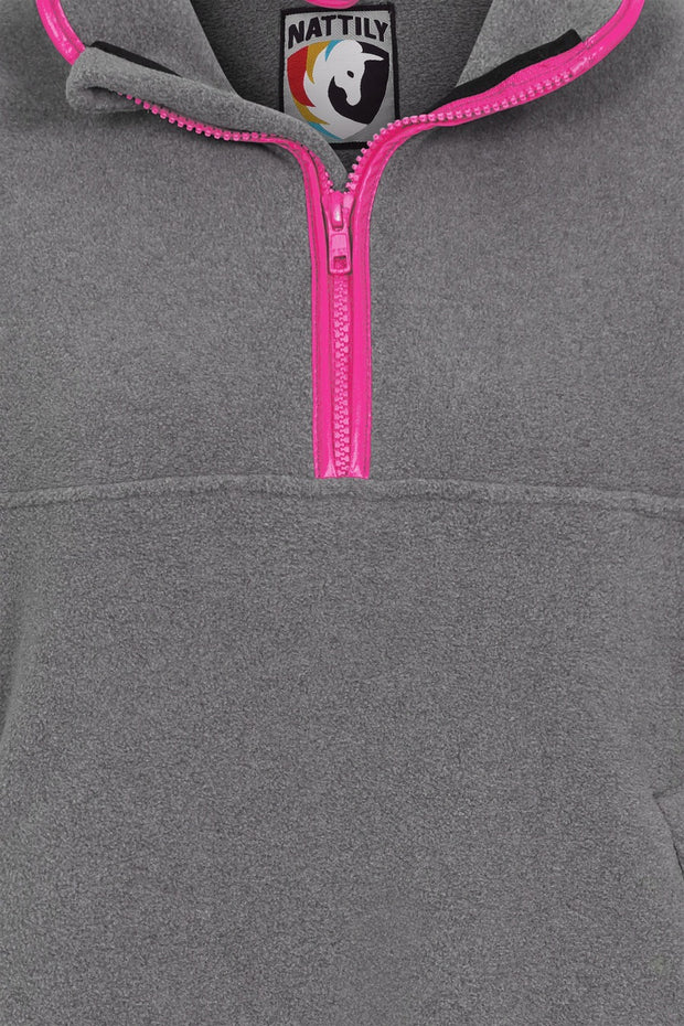 nattily dressed grey fleece quarter zip close up with bright pink trim