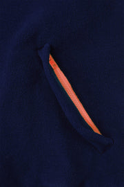 pocket detail of nattily dressed navy blue fleece quarter zip with coral colour trim