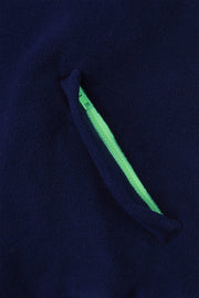 pocket detail view of nattily dressed navy blue fleece quarter zip with mint green trim